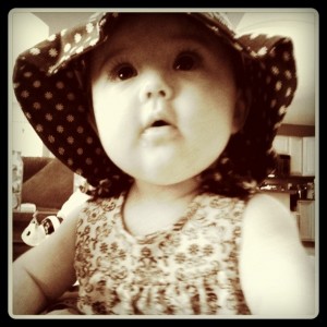 Avery in her matching outfit and hat